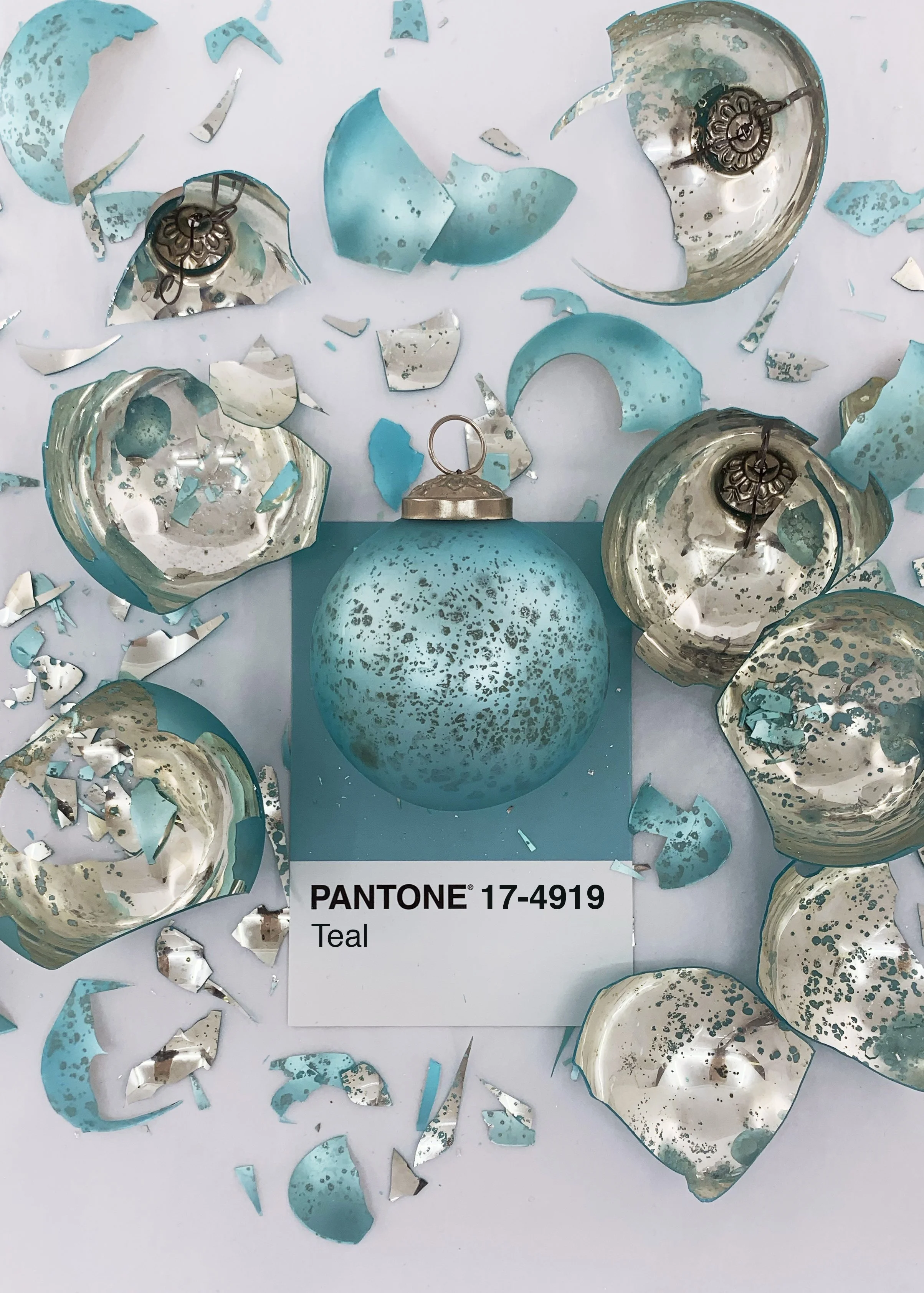 broken-teal-christmas-ornament